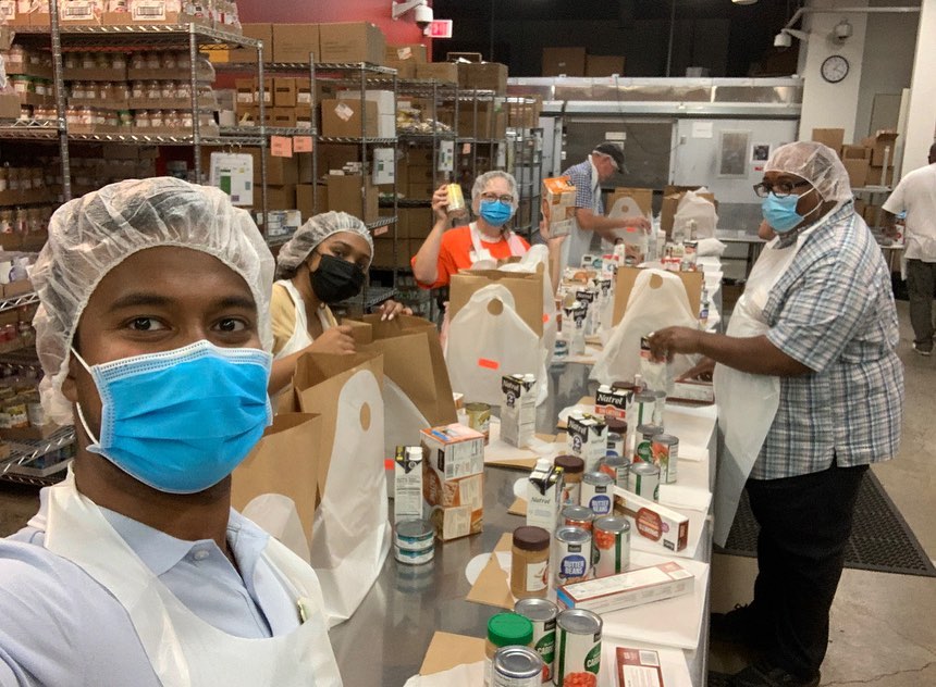 rodham taking volunteers to capitol area food bank